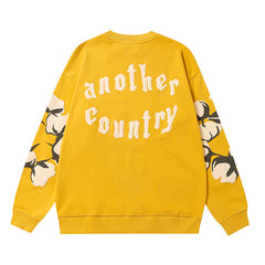 Denim Tears Yellow Crewneck Sweatshirt Front Floral Wreath