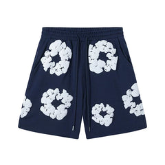 Denim Tears Cotton Wreath Graphic Shorts - Navy Blue / Relaxed Streetwear Fit