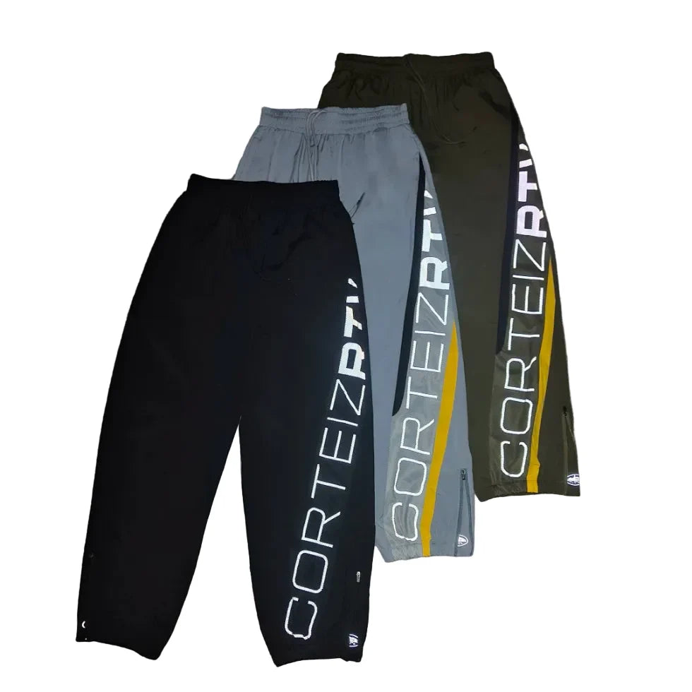 Corteiz trendy high street sports and leisure leggings with patchwork design featuring reflective printed letters and woven pants for men